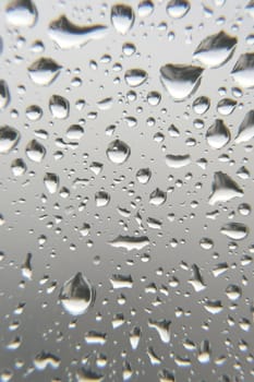 Drops of rain on the window, shallow dof