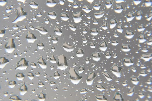 Drops of rain on the window, shallow dof