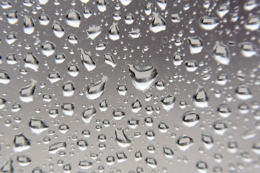 Drops of rain on the window, shallow dof