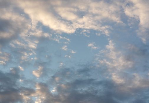 Beautiful eveing sky with clouds, air nature