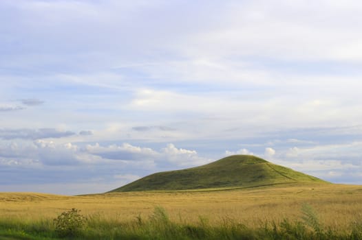 Summer landscape with mountain and blue sky