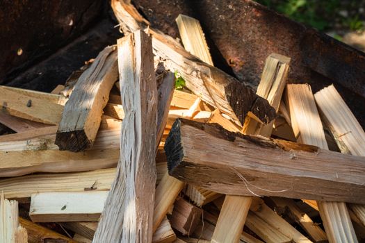 Barbecue preparation with burning wood chips to form coal.