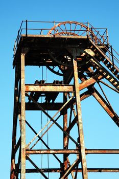 Hoist wheel which was used at a redundent coal mine shaft before energy mining came to an end due to environment global warming concerns