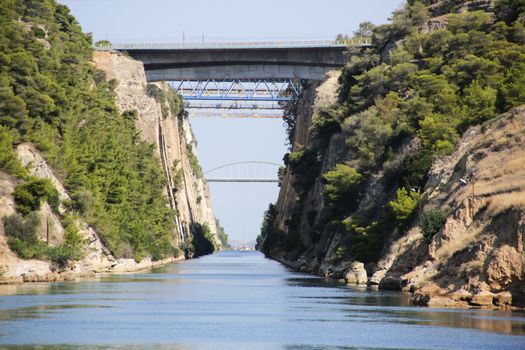 The Corinth Canal is a canal that connects the Gulf of Corinth with the Saronic Gulf in the Aegean Sea, Greece