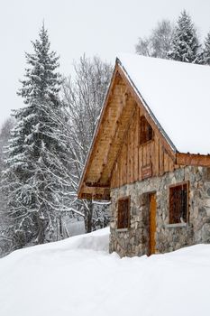 Chalet covered with snow in the French Alps