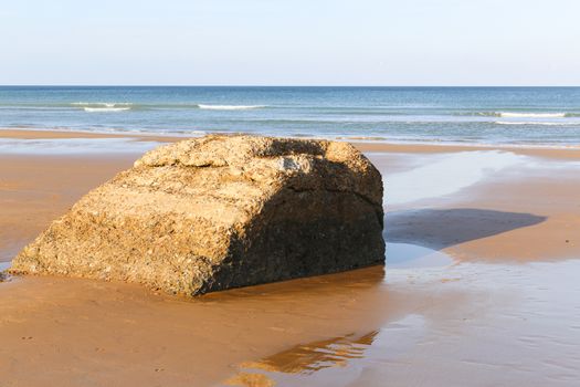 Ruins of harbor built by the Allies in Arromanches, Normandy, France