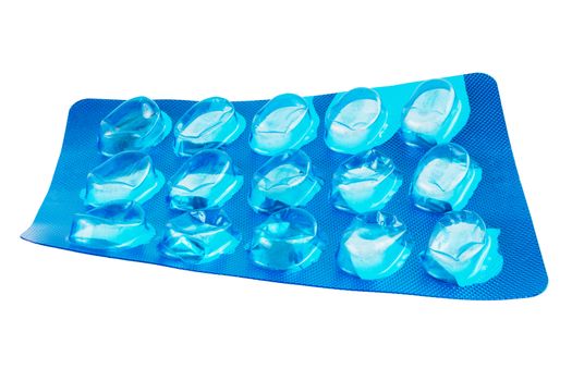 empty blue pills blisterpack container isolated on white background, used pack of medical tablets