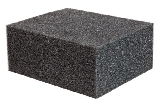 a brick of flat black foam rubber sponge texture and close-up background