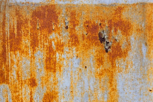 abstract background and texture of white steel surface with orange rust stains.