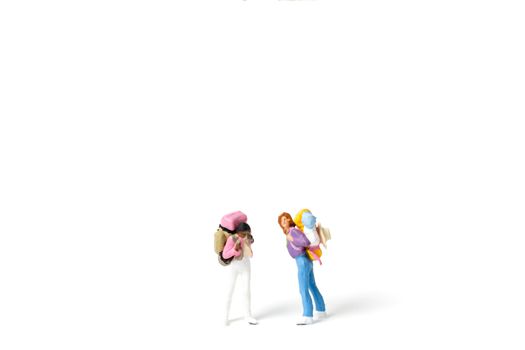 Miniature Backpacker  isolated on white background ,Travel concept