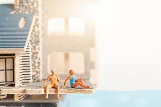 Miniature people stay at home doing self-quarantine to avoid coronavirus, , stay home concept