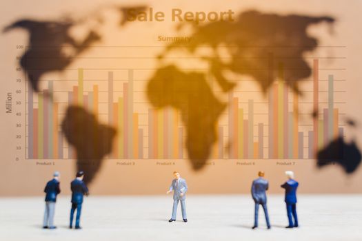 Miniature people :Businessman standing on world map Background , Growing business concept