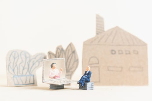 Miniature people working with computer labtop , Work at home concept