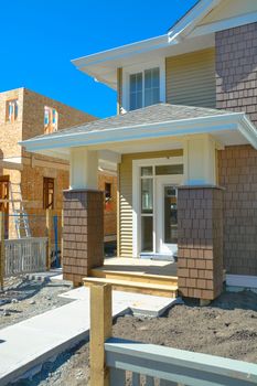 Entrance door of brand new family townhouses on construction completion stage