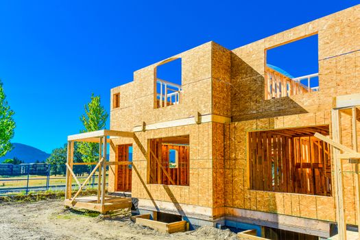 New family house is under construction on sunny day