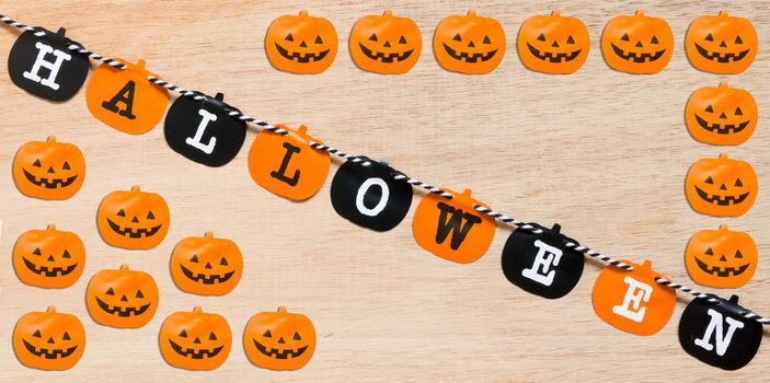 Halloween flags , black and orange flags on wooden background