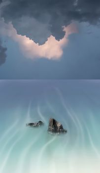 Rocky islands in blue ocean. Clouds in the sky