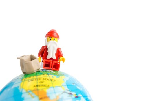 Chiang Mai , Thailand - December 3 , 2017 : Studio shot of LEGO minifigure Santa Claus in Christmas scene.