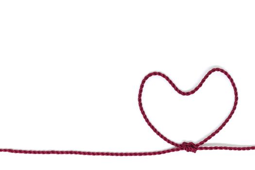 Heart Shaped Knot on a rope on white background