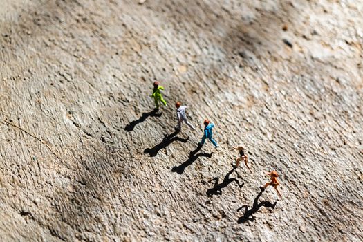 Miniature people : Group of people are running  on concrete floor ,  Healthy and lifestyle concept