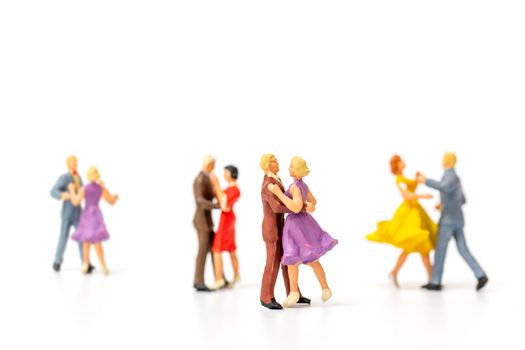 Miniature people , Couple dancing on white  background , Valentine's day concept