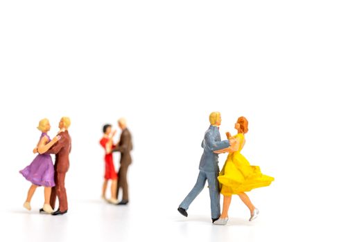 Miniature people , Couple dancing on white  background , Valentine's day concept