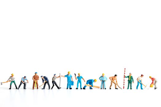 Miniature people ,worker team standing on white background and copy space for your text , Labour day concept