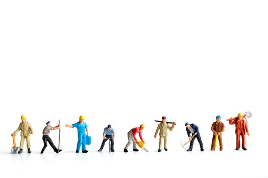 Miniature people ,worker team standing on white background and copy space for your text , Labour day concept