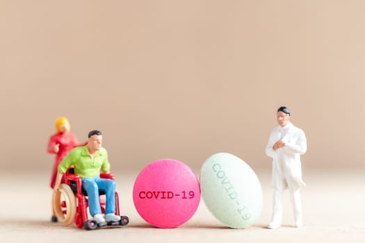 Miniature people , Doctor research and Development Coronavirus Vaccine , Medicine to stop outbreak Coronavirus COVID-19.