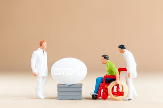 Miniature people , Doctor research and Development Coronavirus Vaccine , Medicine to stop outbreak Coronavirus COVID-19.
