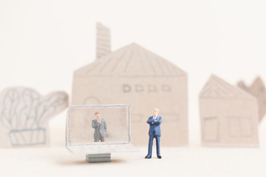 Miniature people working with computer labtop , Work at home concept