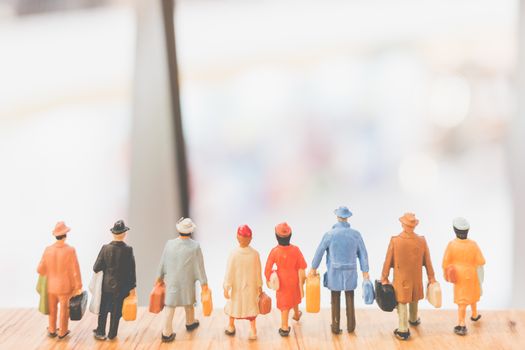 Miniature people : Travellers walking on The bridge , Holiday and Travel concept