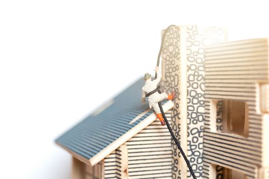 Miniature people stay at home doing self-quarantine , stay home concept