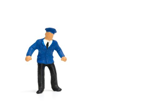 Miniature people : Policeman standing isolate on white background