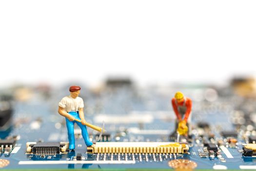 Miniature people working on cpu board, Technology concept