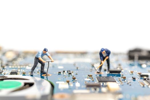 Miniature people working on cpu board, Technology concept
