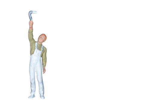 Miniature people : Painter holding a brush isolated on white and clipping path