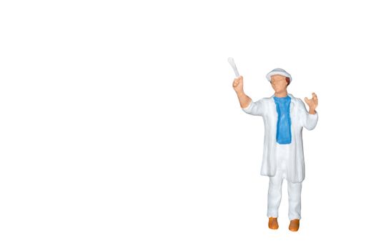 Miniature people : Painter holding a brush isolated on white and clipping path
