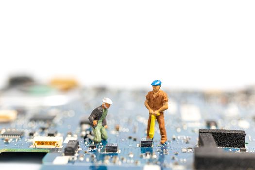 Miniature people working on cpu board, Technology concept
