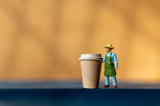 Miniature People and Coffee to-go Cup , Coffee delivery concept