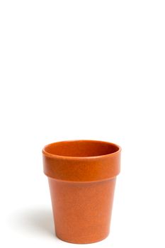 Recycled materials biodegradable tree pot isolated on a white background