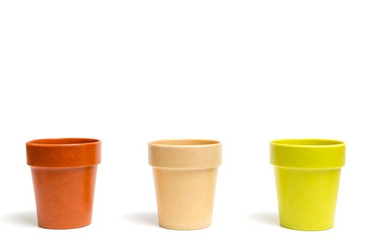 Recycled materials biodegradable tree pot isolated on a white background