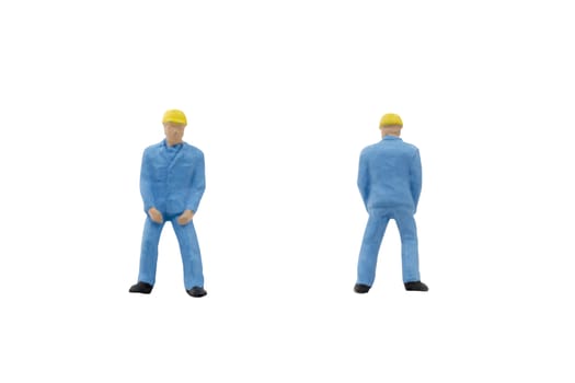 Miniature people worker construction concept on white background with clipping path