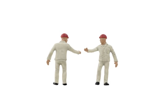 Miniature people worker construction concept on white background with clipping path