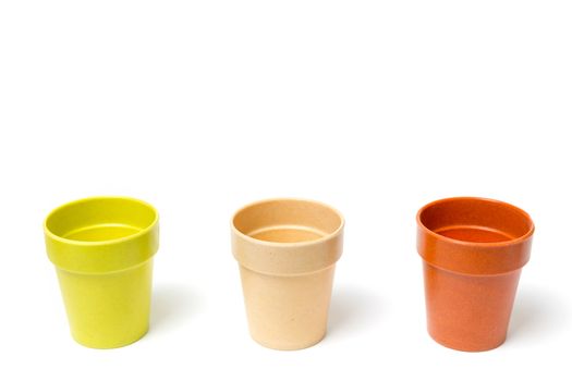 Recycled materials biodegradable tree pot isolated on a white background