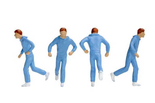 Miniature people running isolated on white background with clipping path