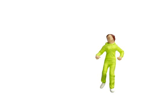 Miniature people running isolated on white background with clipping path