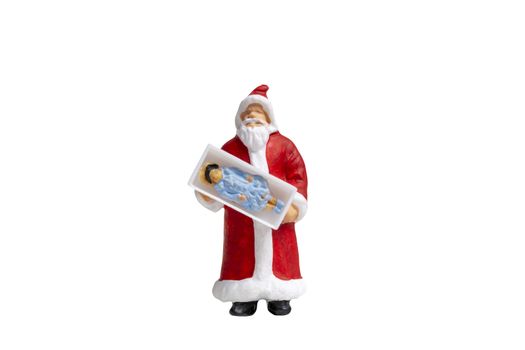 Miniature people Santa Claus holding gift box  isolated on white background with clipping path