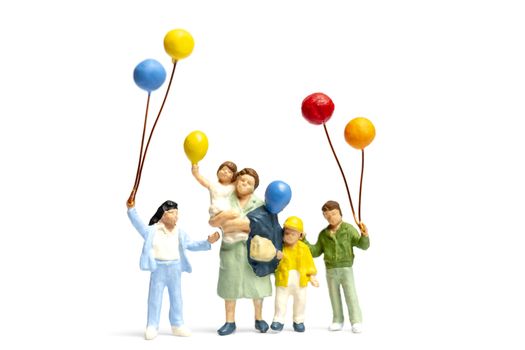 Miniature people children holding balloon isolate on white background