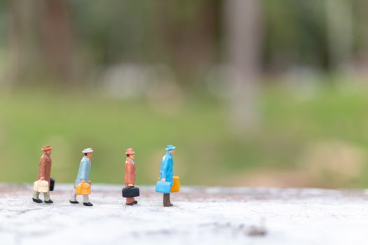Miniature people : Traveler walking on street  , Travel and Adventure concepts.
